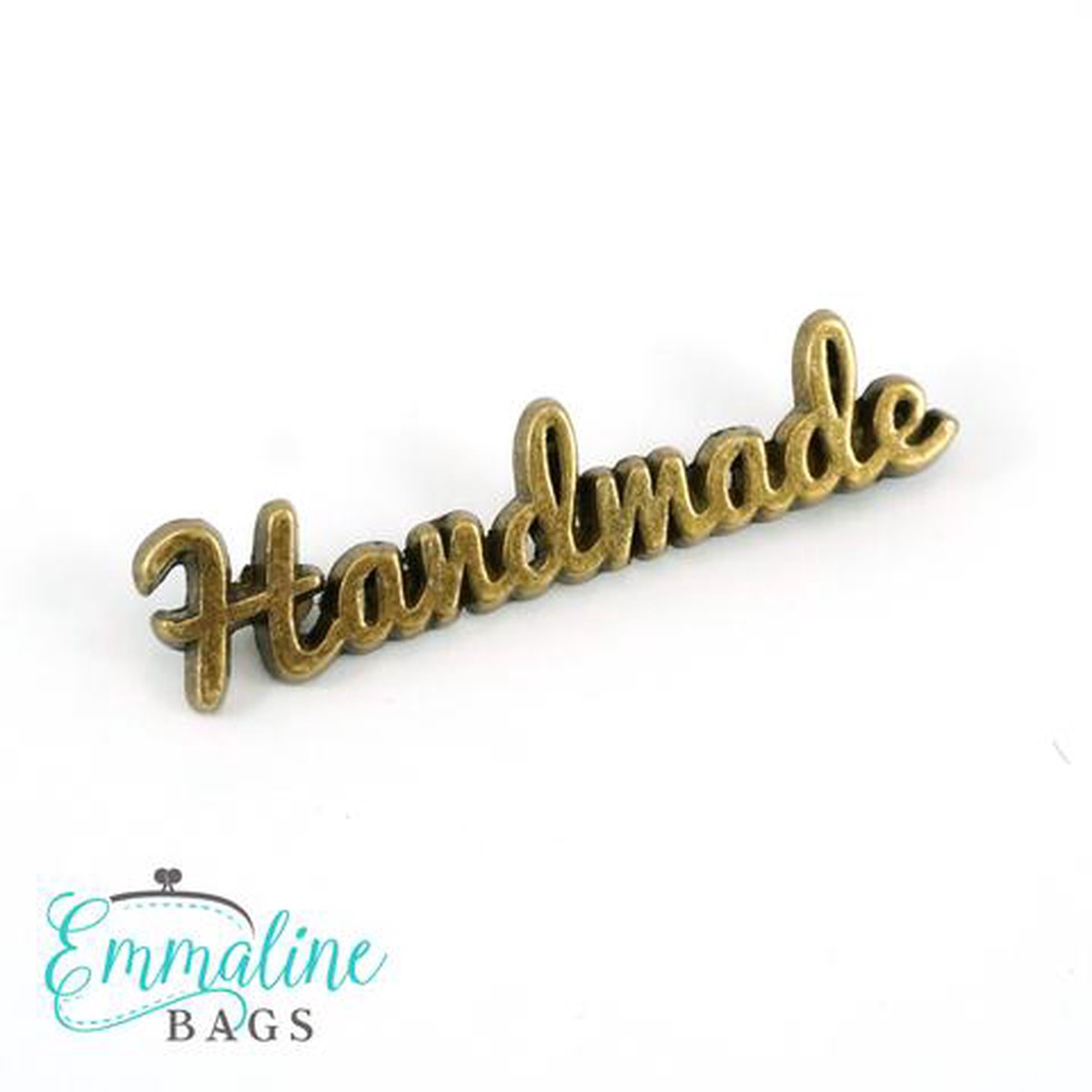emmaline-bags-script-style-handmade-metal-bag-label-antique-brass