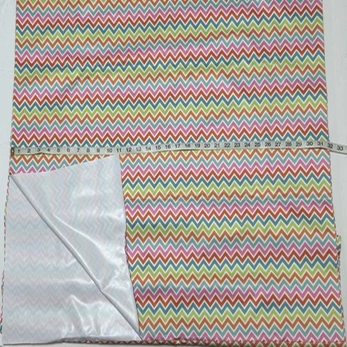 zigzag-rainbow-lines-on-white-babyville-waterproof-pul-fabric-sold-by-halfyd