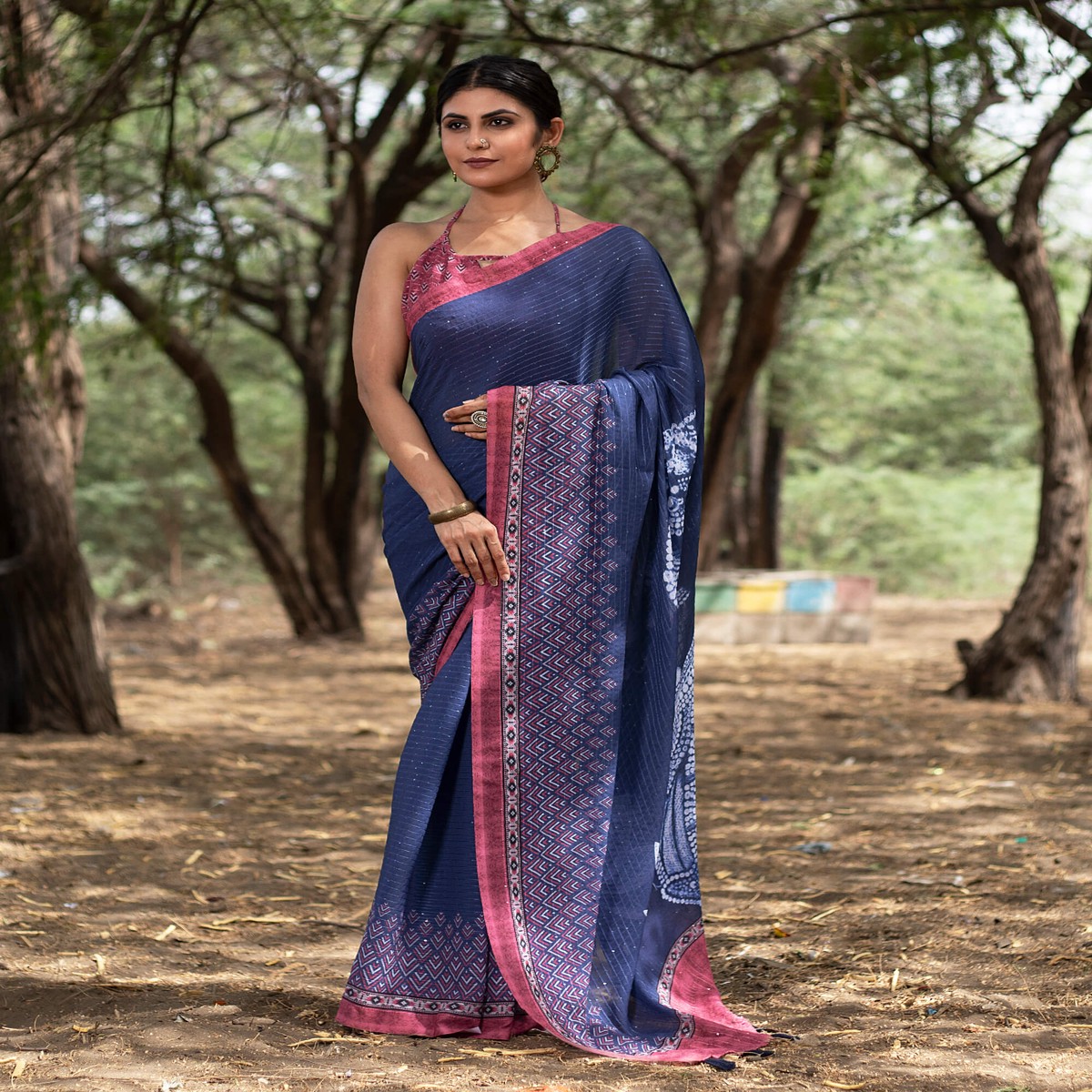 navy-blue-and-cannon-pink-quirky-pattern-premium-sequins-georgette-saree-with-tassels