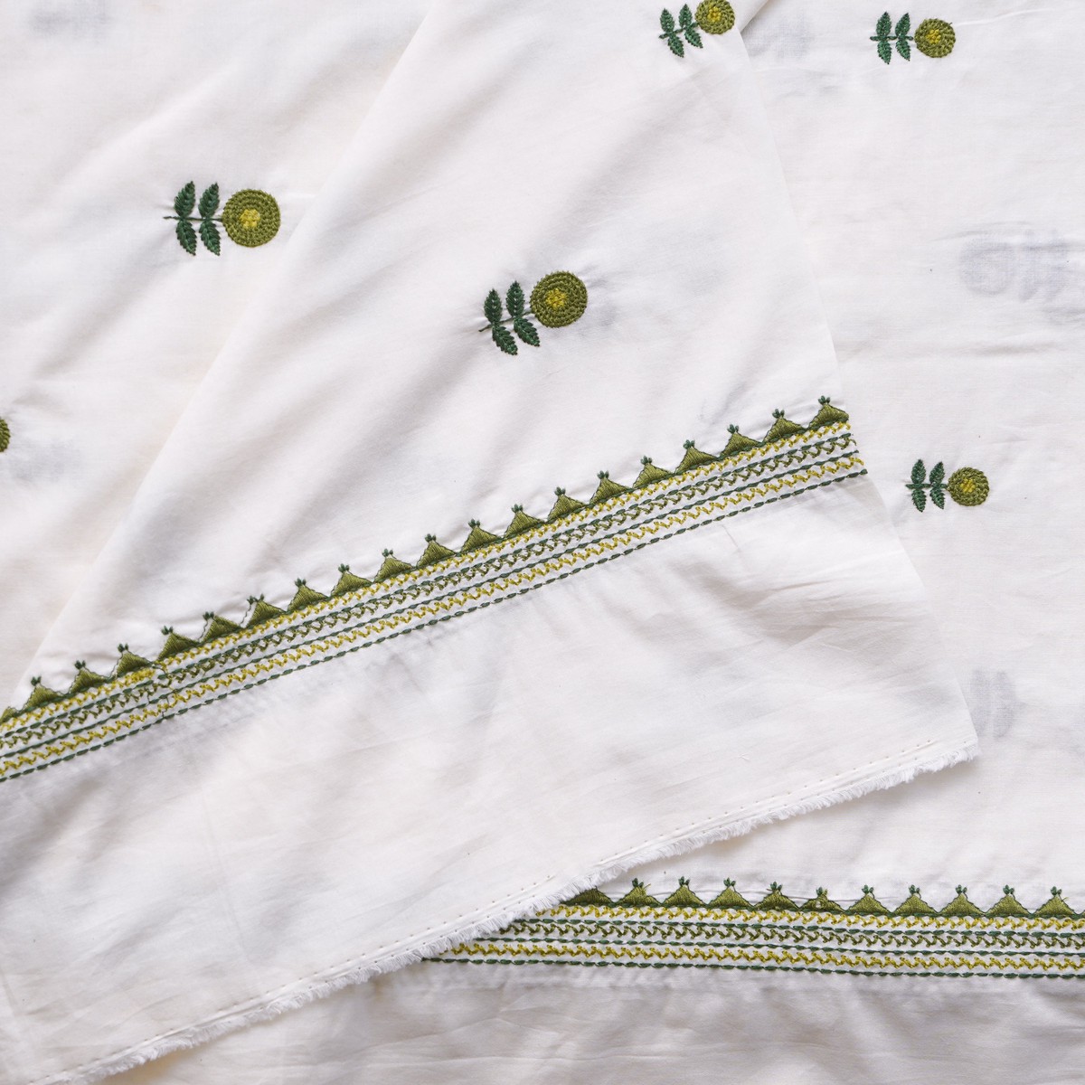 width-45-inches-pure-cotton-handloom-white-with-green-with-light-green-flowers-motif-embroidery-hand-woven-fabric
