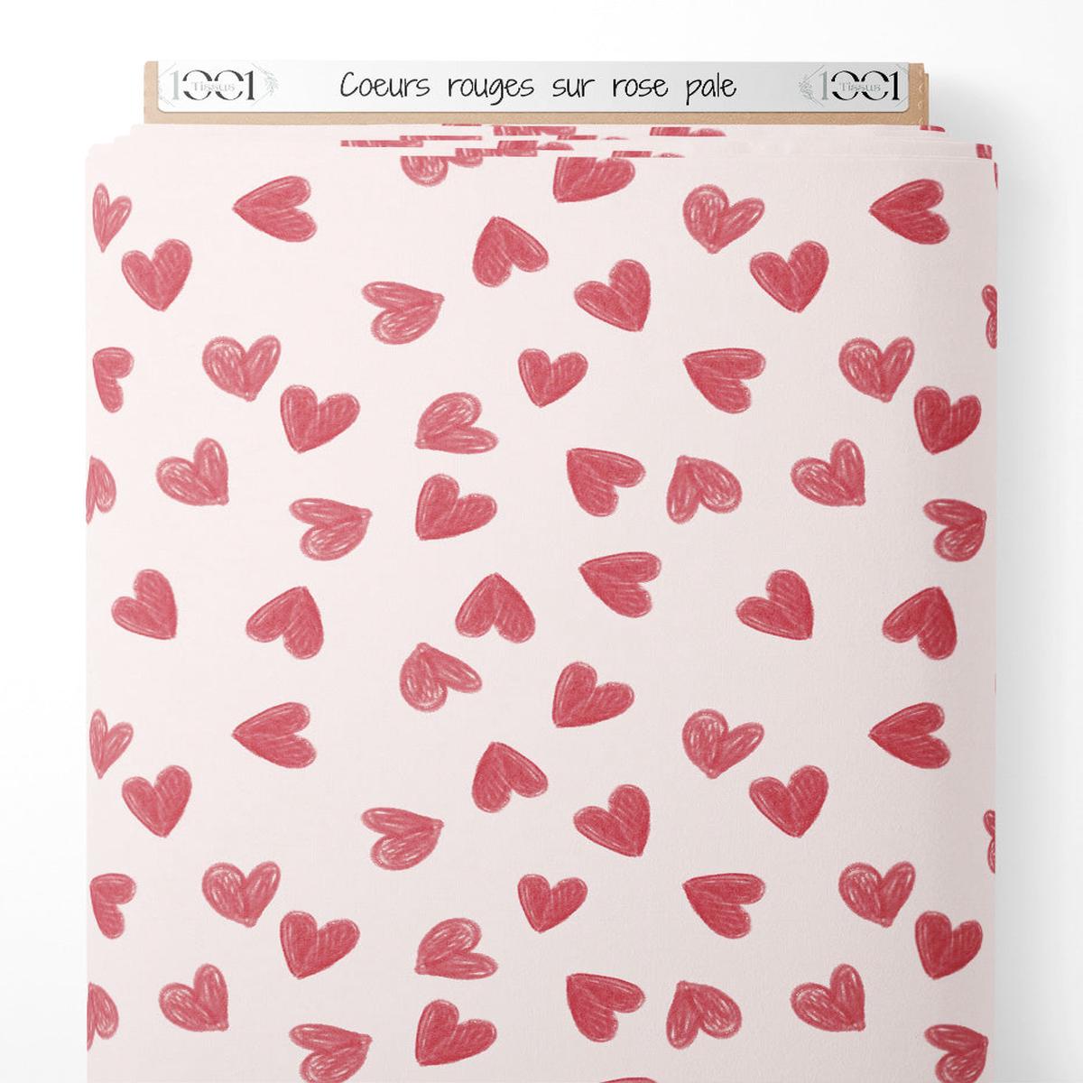 tissu-curs-rouges-sur-rose-ple