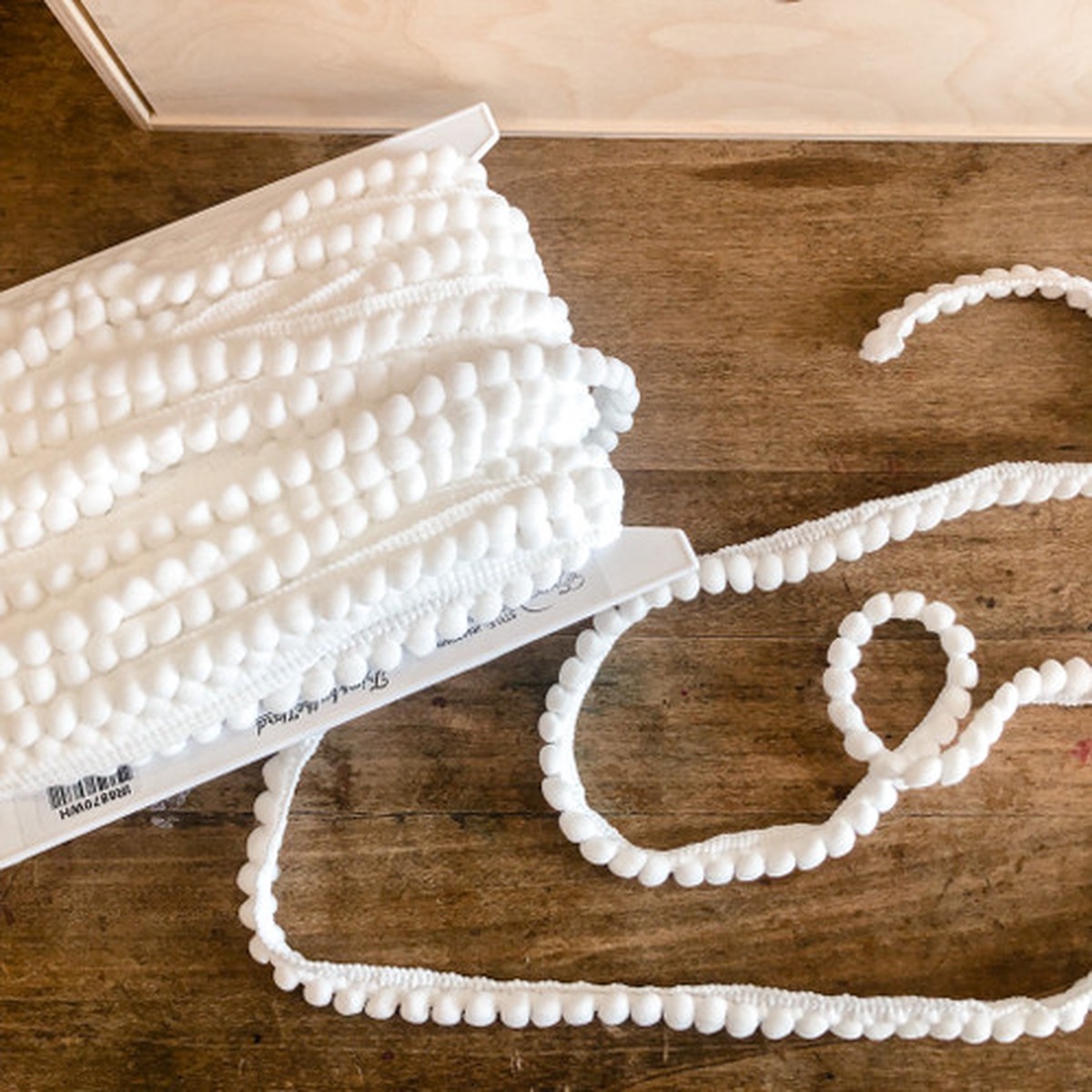 baby-pom-pom-trim-in-white-1-2-sold-by-the-1-4-yard
