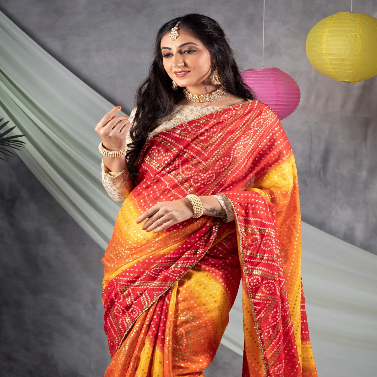red-and-yellow-bandhanii-pattern-foil-print-kota-doria-saree-with-zari-lace-border