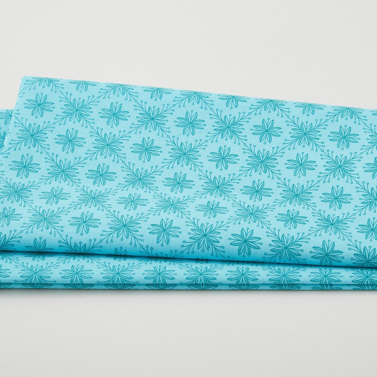 alpine-valley-poinsettia-aqua-2-yard-cut