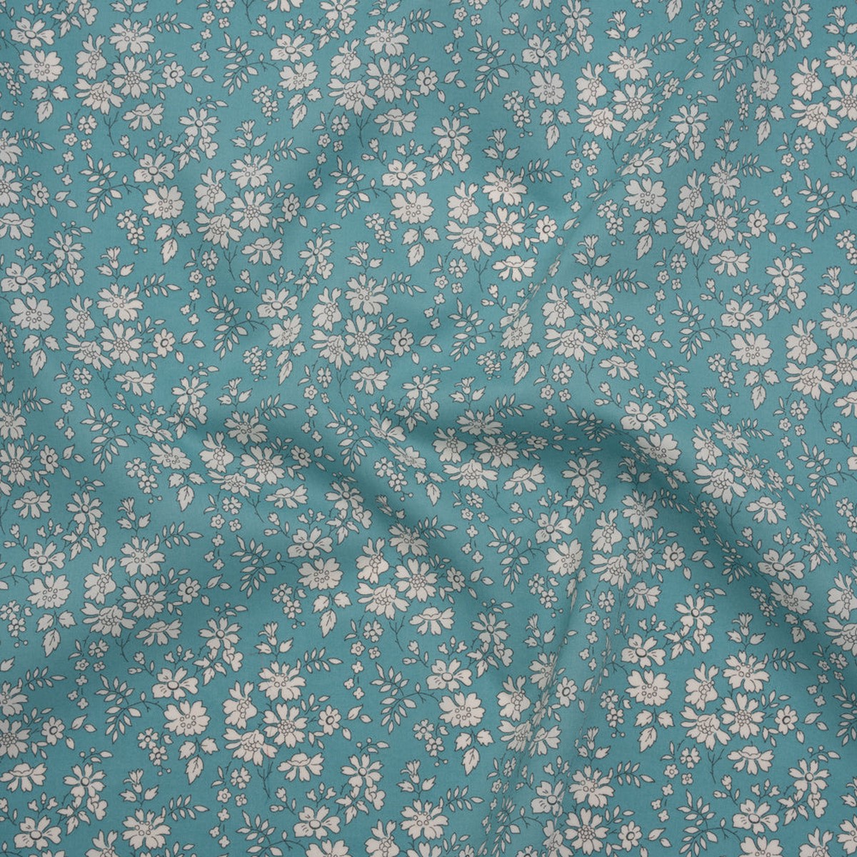 liberty-fabrics-tana-lawn-capel-blue-turquoise-aqua-blue-and-white-outlined-florals