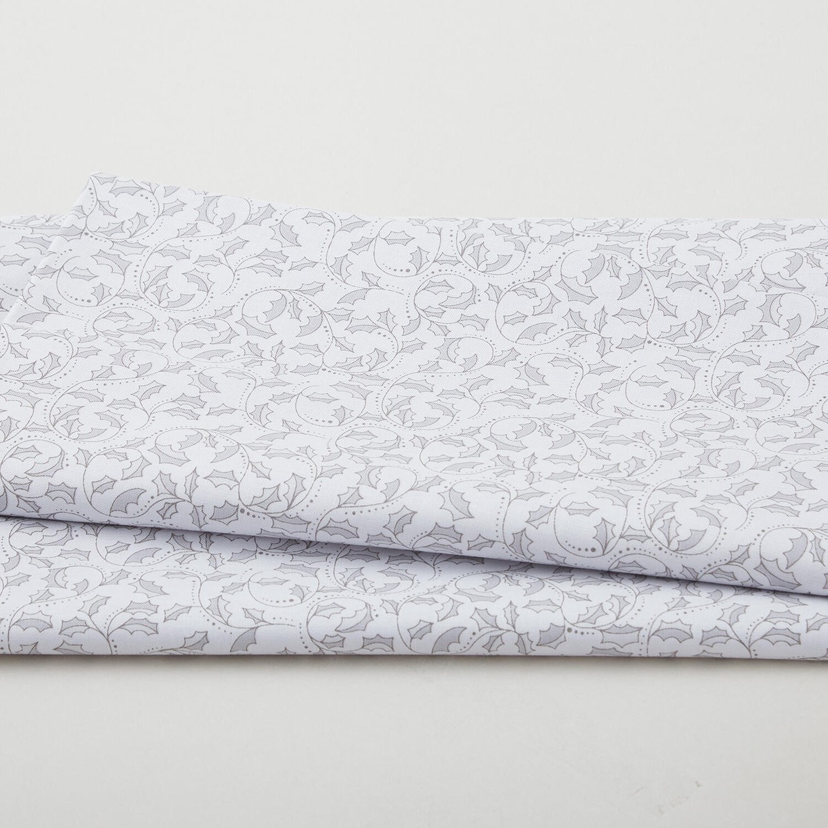a-botanical-season-holly-leaf-scroll-grey-2-yard-cut