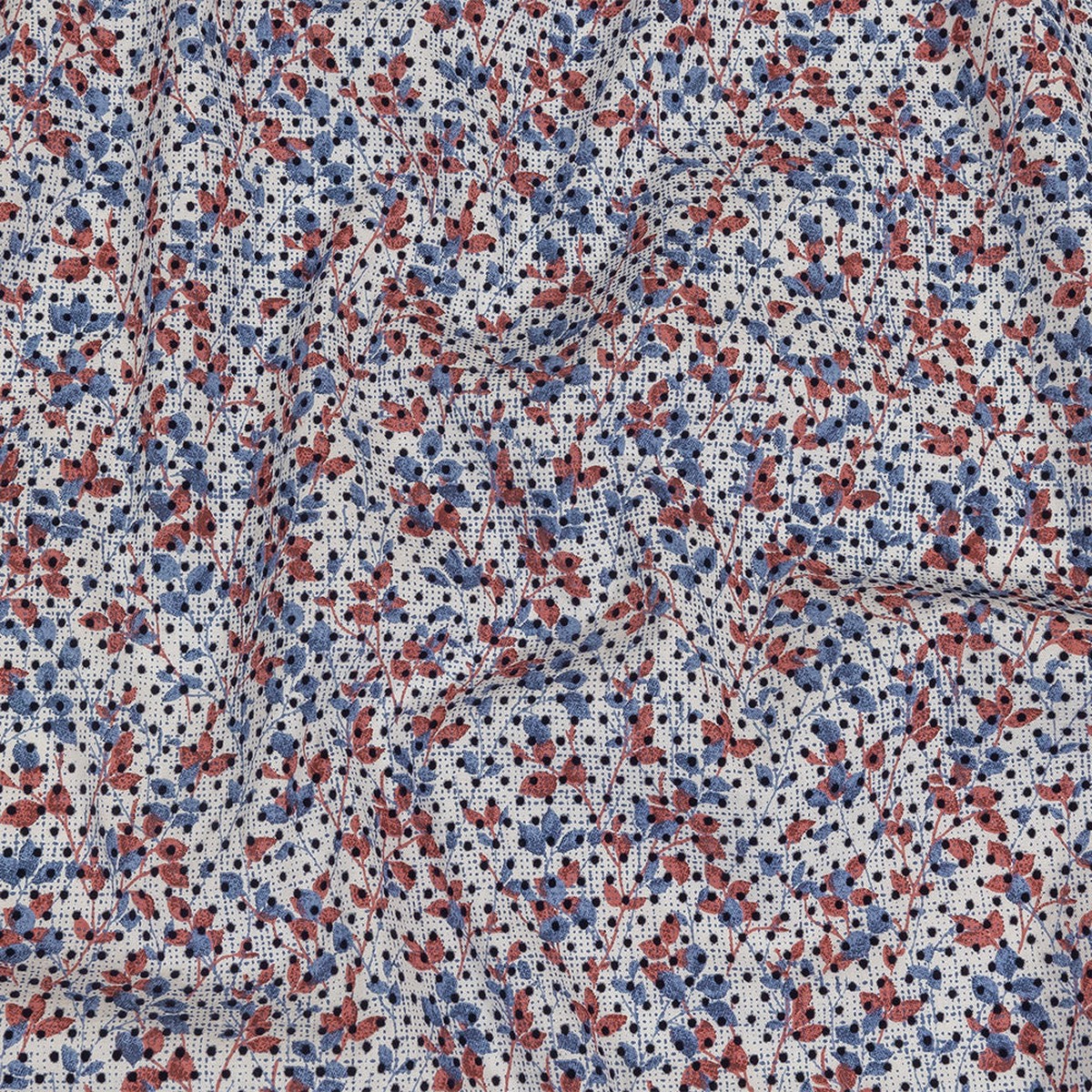 black-flocked-polka-dots-on-red-white-and-blue-leaves-and-dots-stretch-cotton-shirting