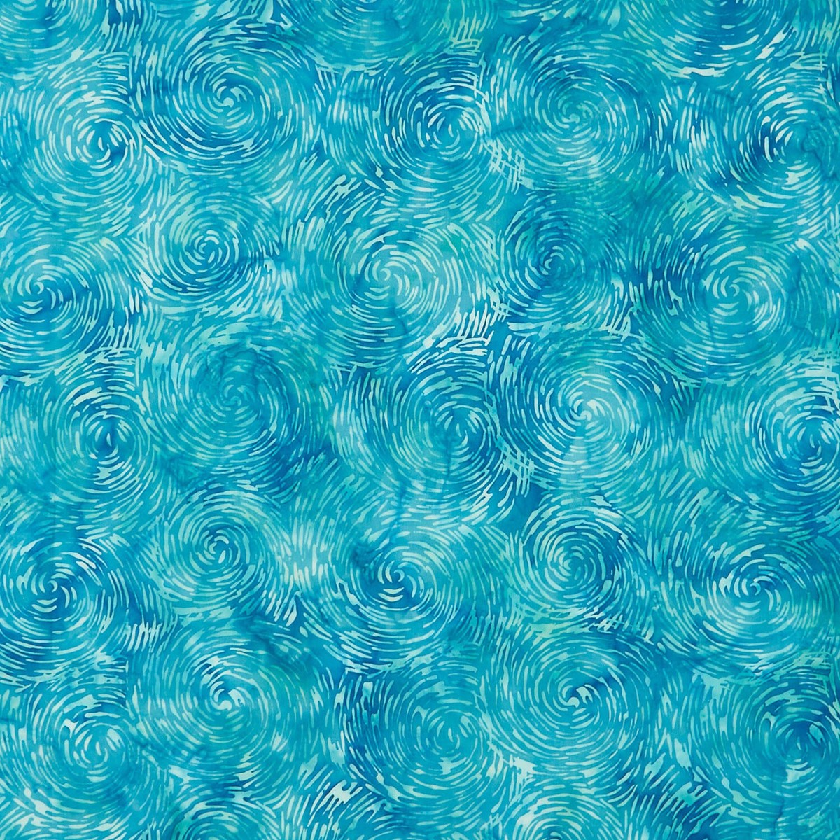 fiesta-batiks-swirl-sun-turquoise-yardage