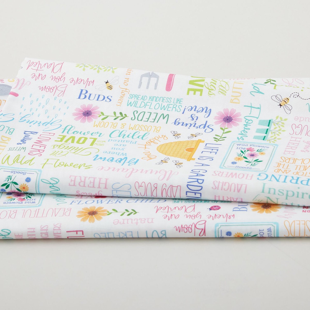love-grows-here-blossom-bloom-words-white-2-yard-cut