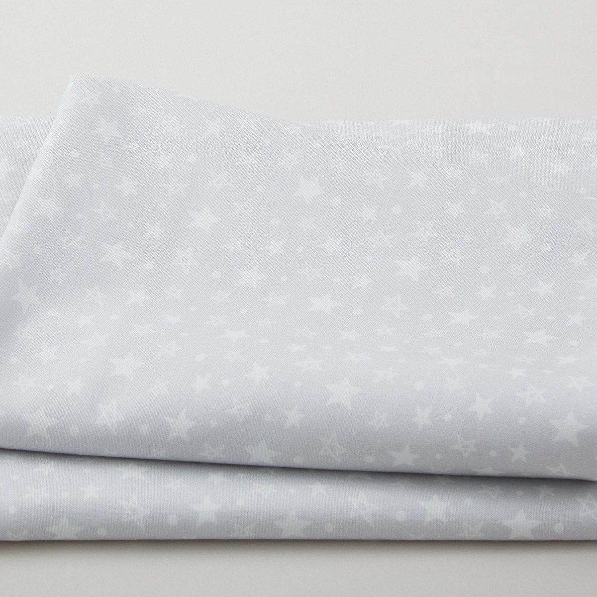 to-the-moon-and-back-dotty-star-snow-3-yard-cut