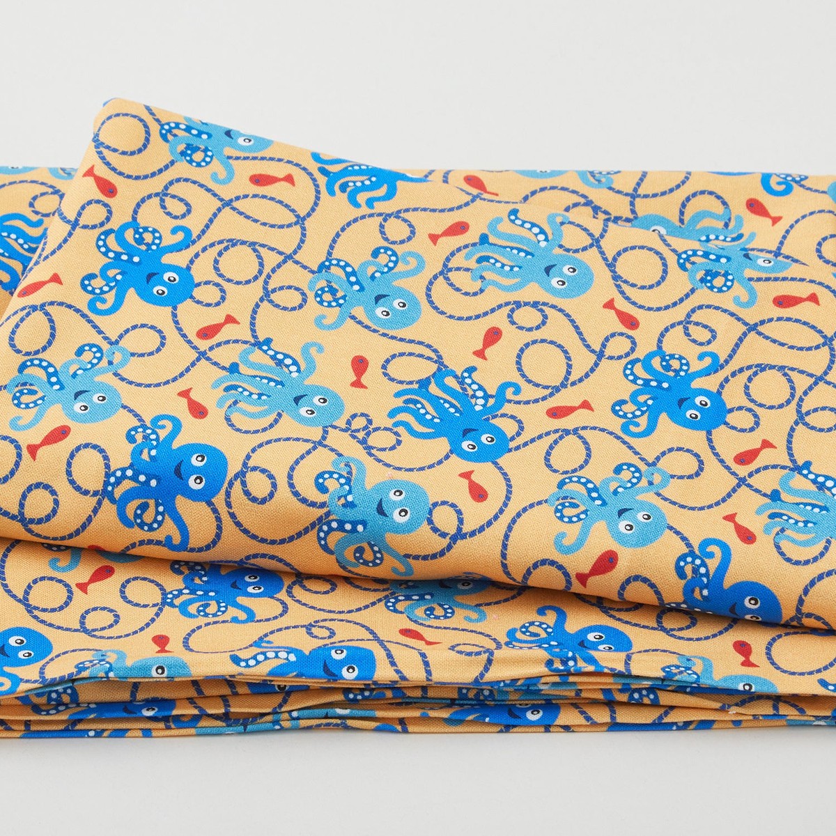 woof-woof-pirates-smiling-octopus-gold-2-yard-cut
