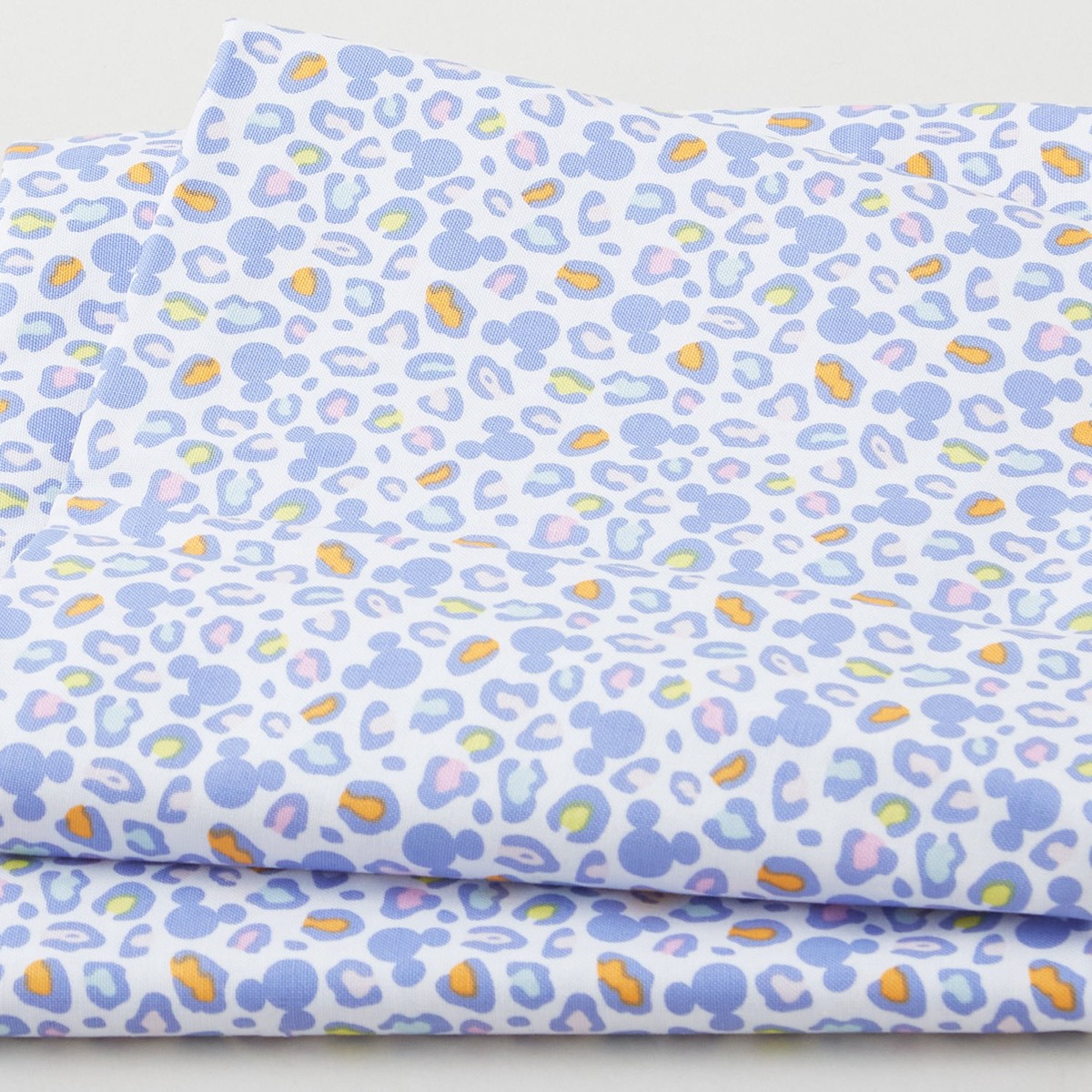 mickey-mouse-play-all-day-mickey-ears-animal-print-2-yard-cut