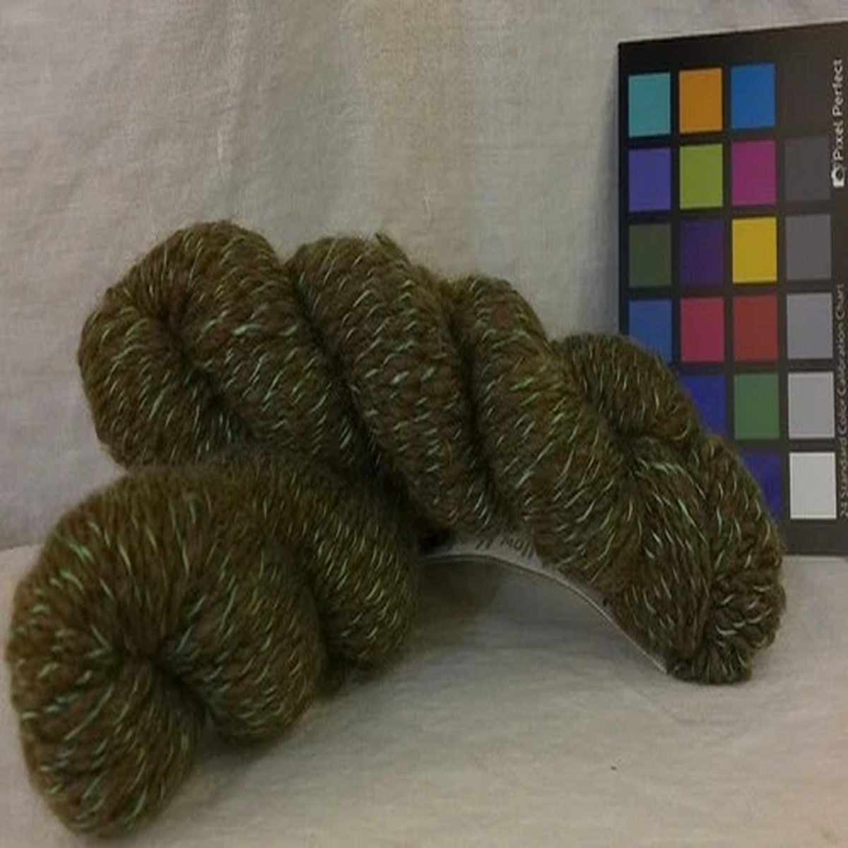 2-evening-moss-green-plied-white-handspun-silk-wool-2-ply-yarn-sport-206-yard