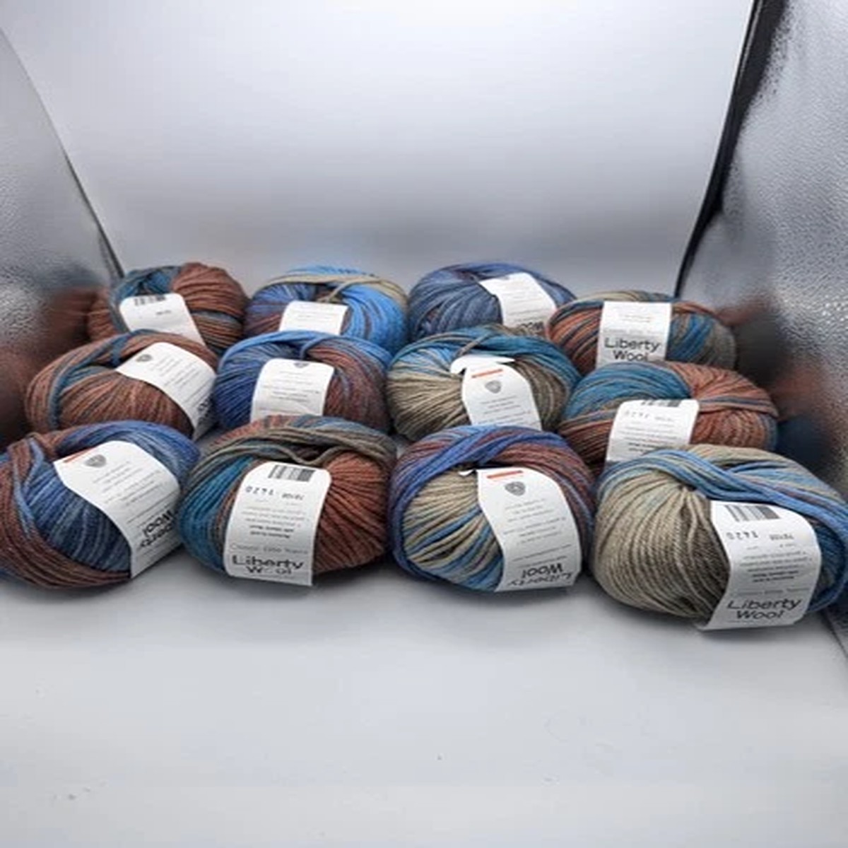 classic-elite-yarns-liberty-wool-12-skein-lot-color-78108-wool-tan-brown-blue