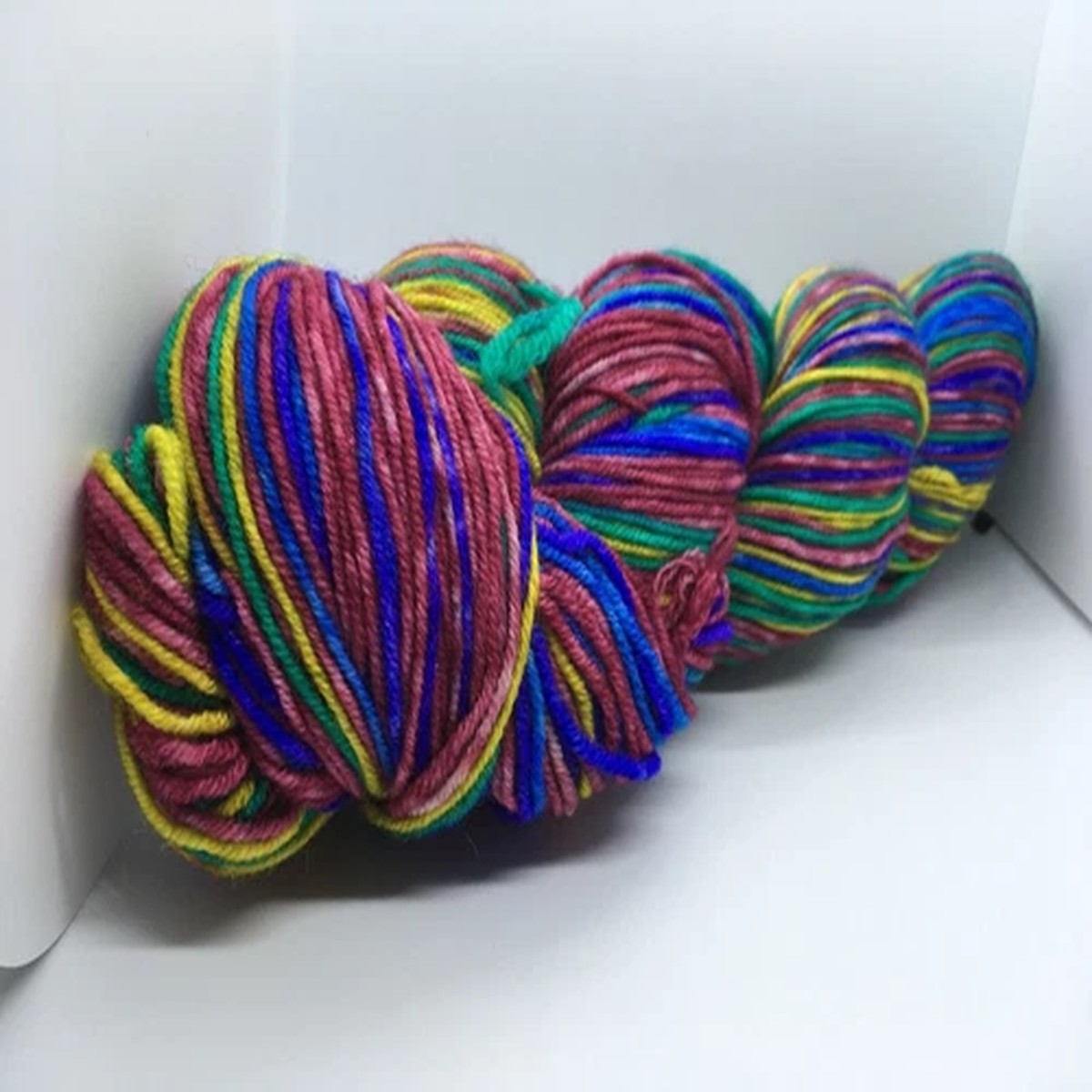 burgundy-blue-green-yellow-hand-dyed-sock-merino-wool-yarn-ice-68864-superwash