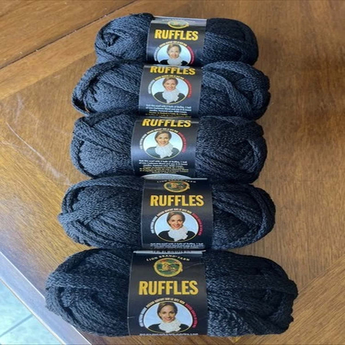 lion-brand-yarn-5-skiens-ruffles-black-color-153-21-yards-50-wool-50-acrylic