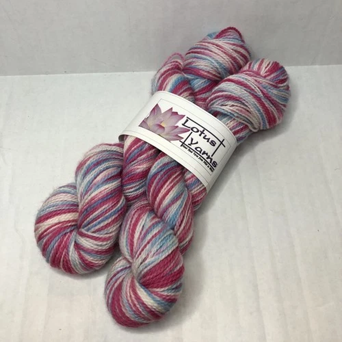 lotus-yarns-superwash-merino-430-yds-total-snow-cherries