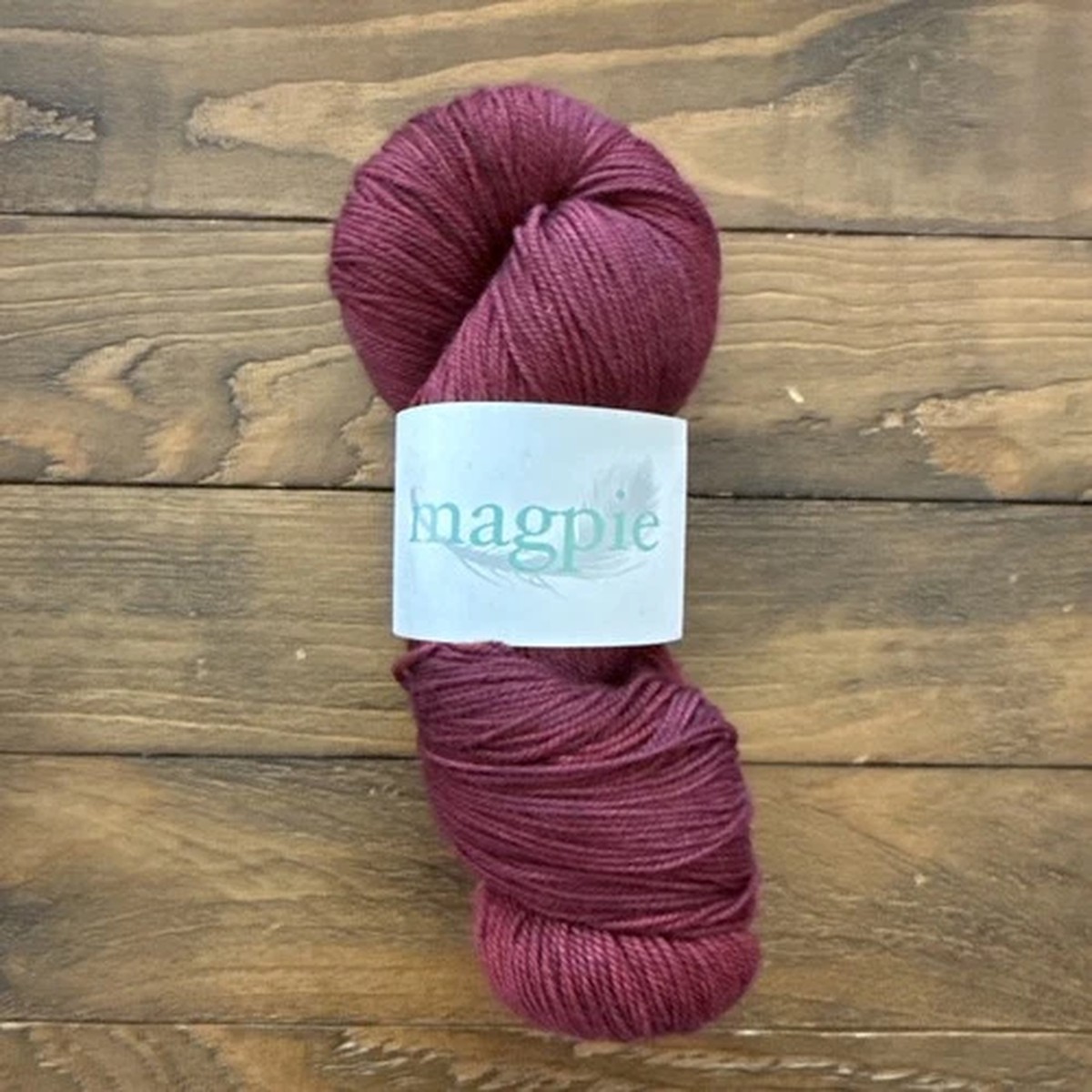 magpie-fibers-swanky-sock-yarn-skein-red-red-wine-400-yds-115-grams
