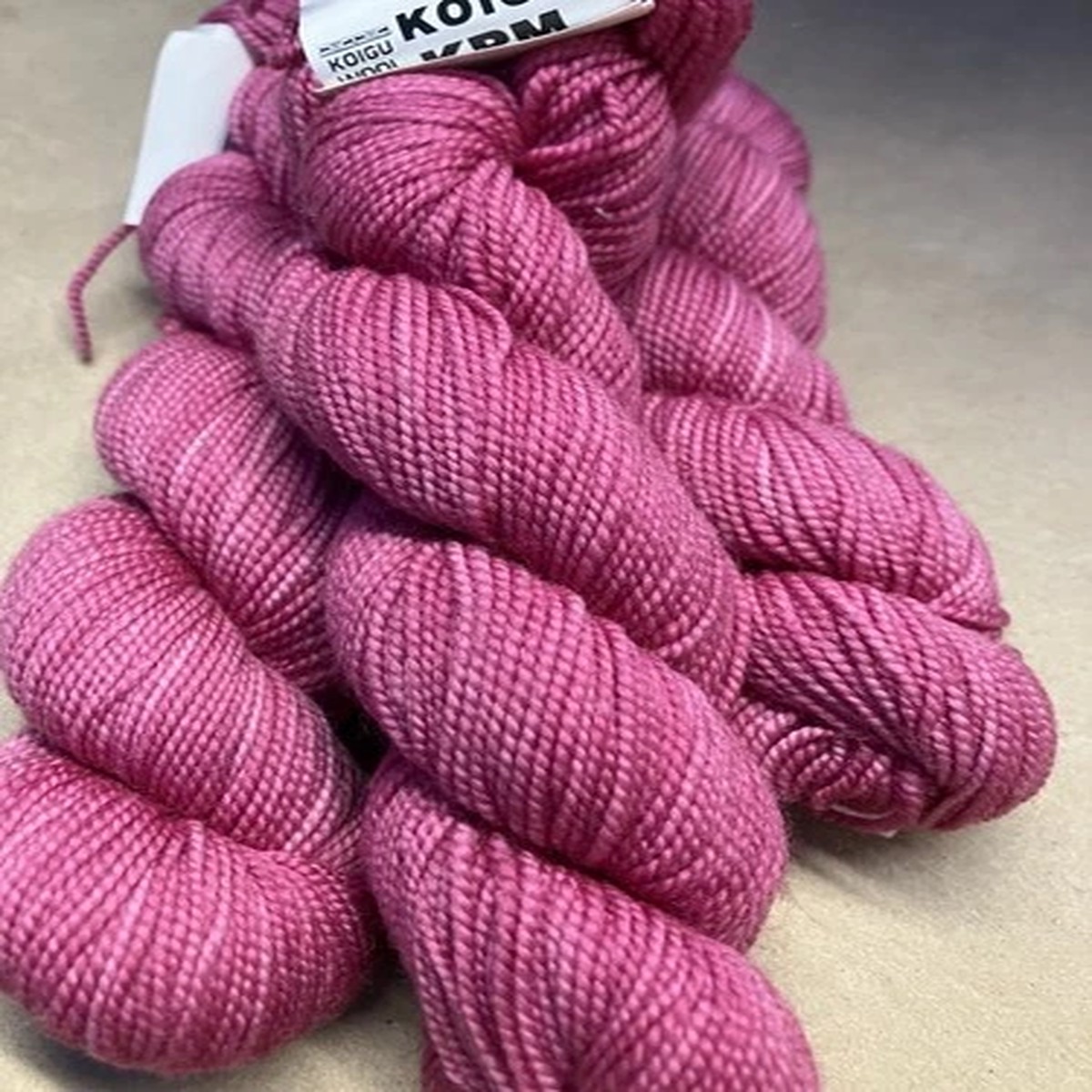 skein-koigu-kpm-yarn-175-yards-fingering-color-2233-pink