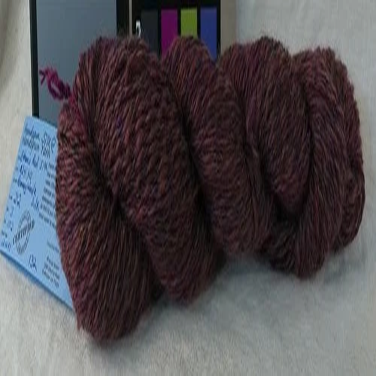 ethan-s-handspun-red-silk-and-red-burgandy-wool-yarn-2-ply-212-yards
