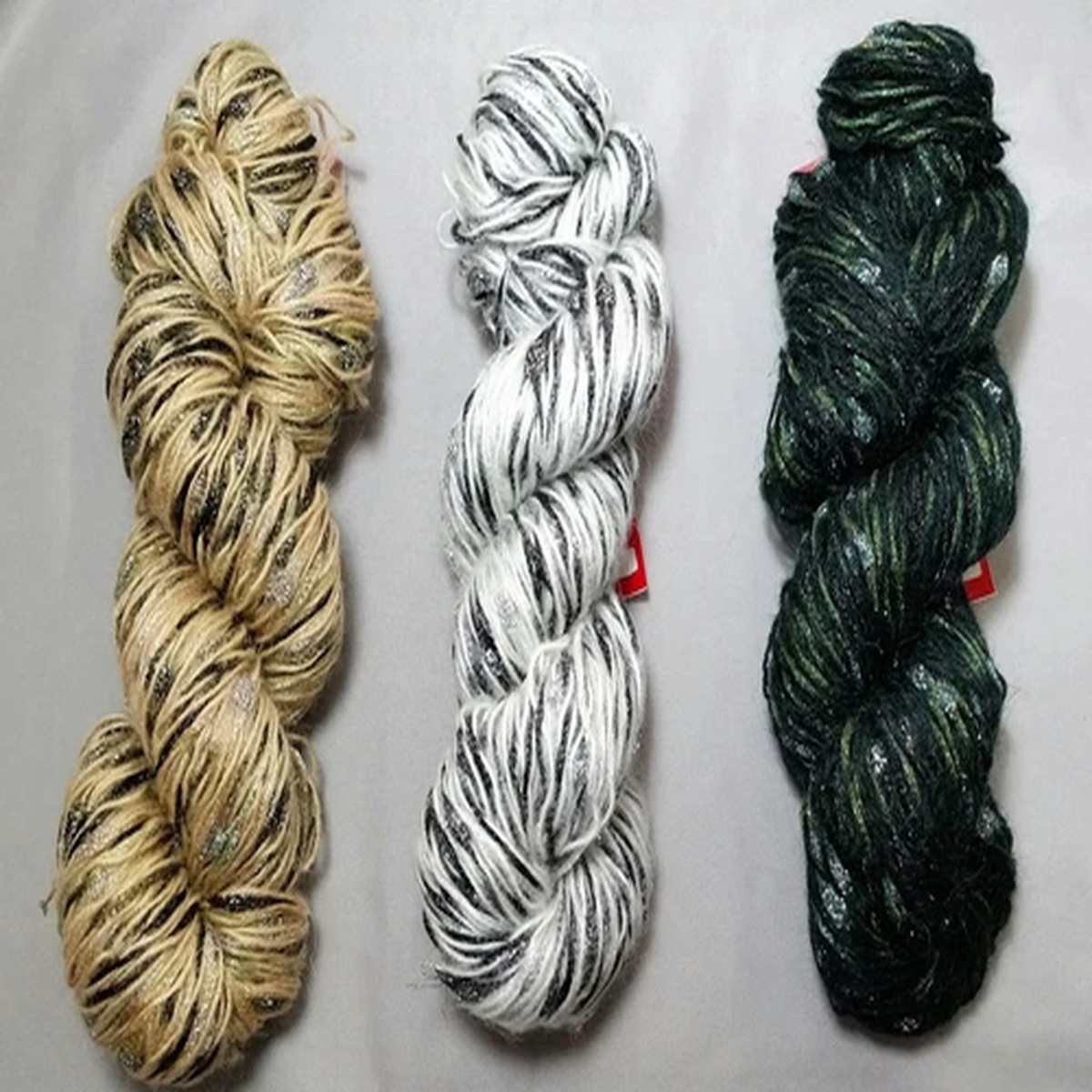 feza-dali-metallic-glitzy-yarn-wool-acrylic-nylon-camel-dark-forest-salt-pepper