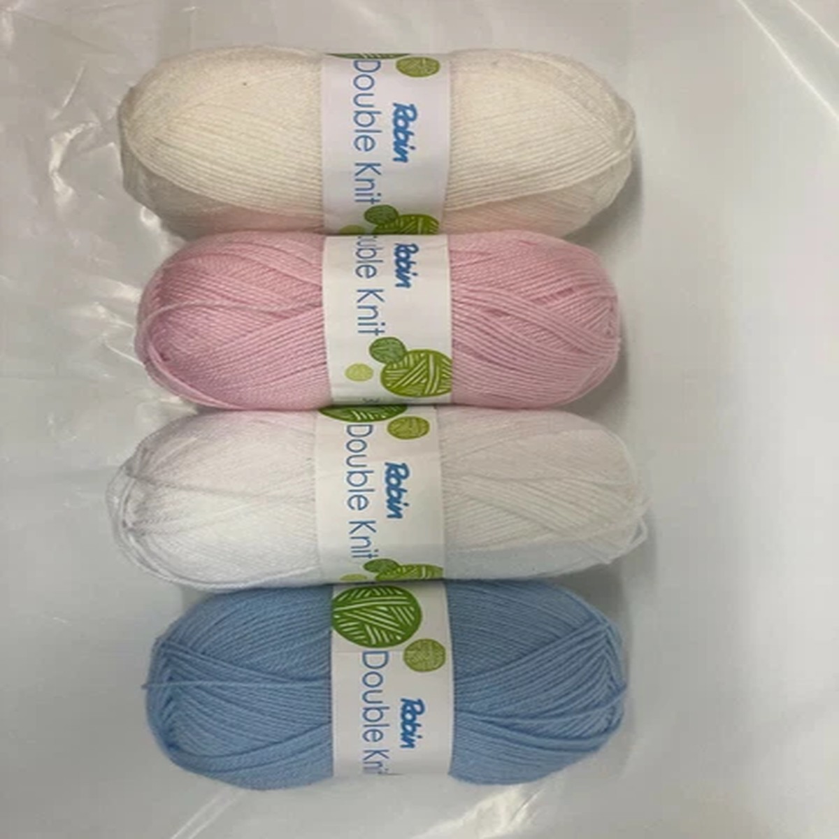 five-balls-robin-double-knitting-yarn-white-cream-baby-pink-blue-wool-crochet-dk