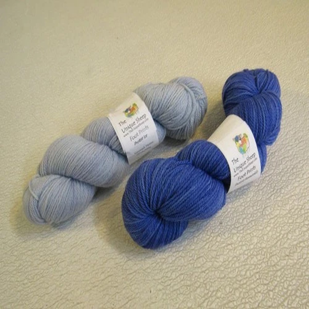 unique-sheep-foot-prints-yarn-blue-sport-weight-protist-ice-protist-periwinkle