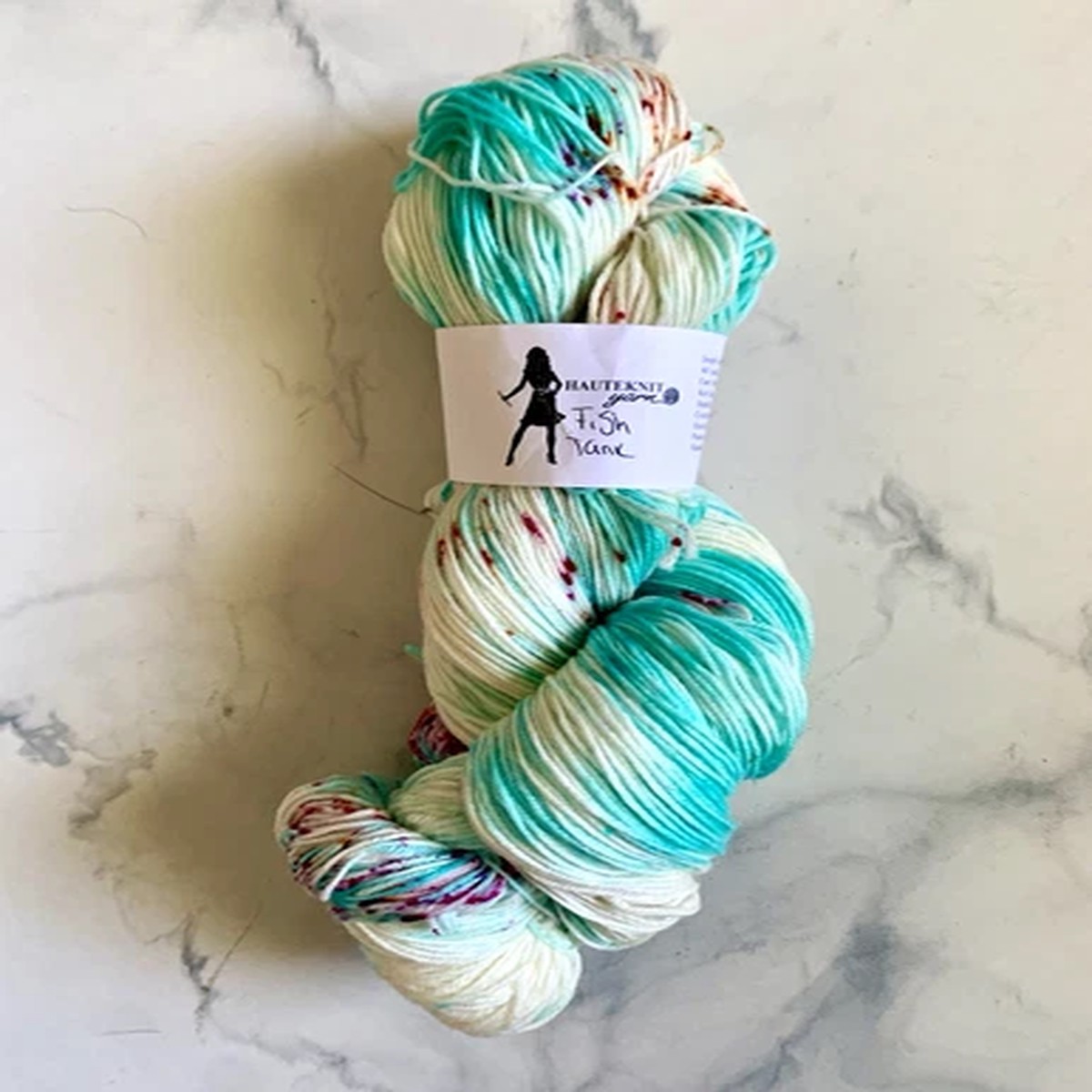 hauteknit-yarn-simple-sock-4-ply-sock-yarn-sw-merino-nylon-turquoise-speckled
