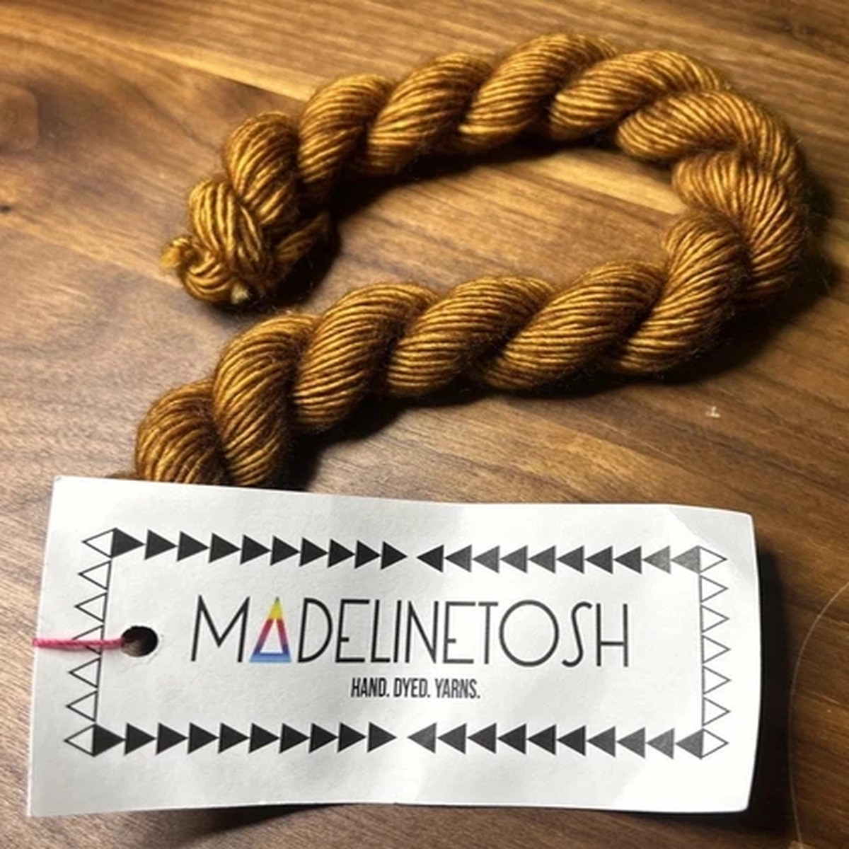 madelinetosh-hand-yarn-unicorn-tail-100-sw-merino-wool-yarn-glazed-pecan-gold