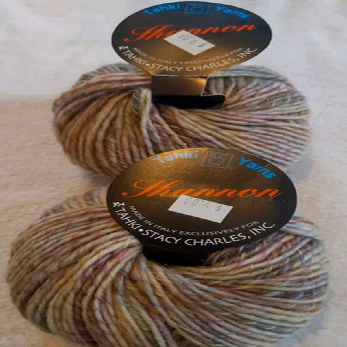 shannon-by-tahki-yarns-100-wool-yarn-roll-color-23-multi-made-in-italy