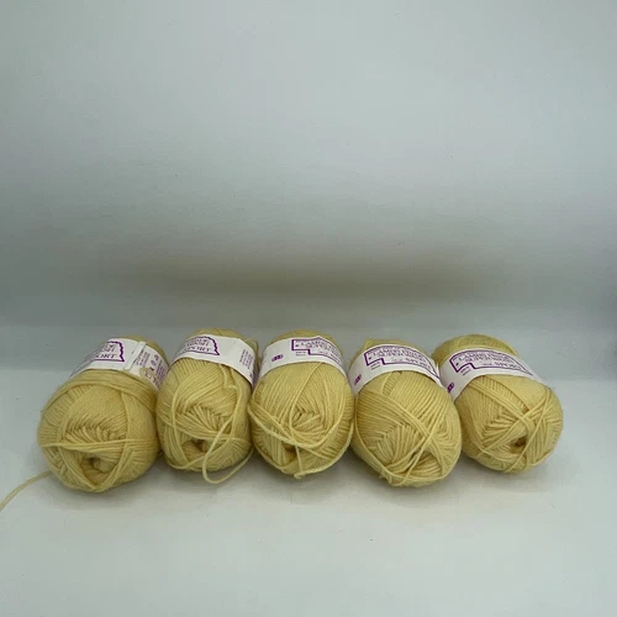 lambs-pride-5-lemon-ice-brown-sheep-superwash-sport-100-wool-skeins