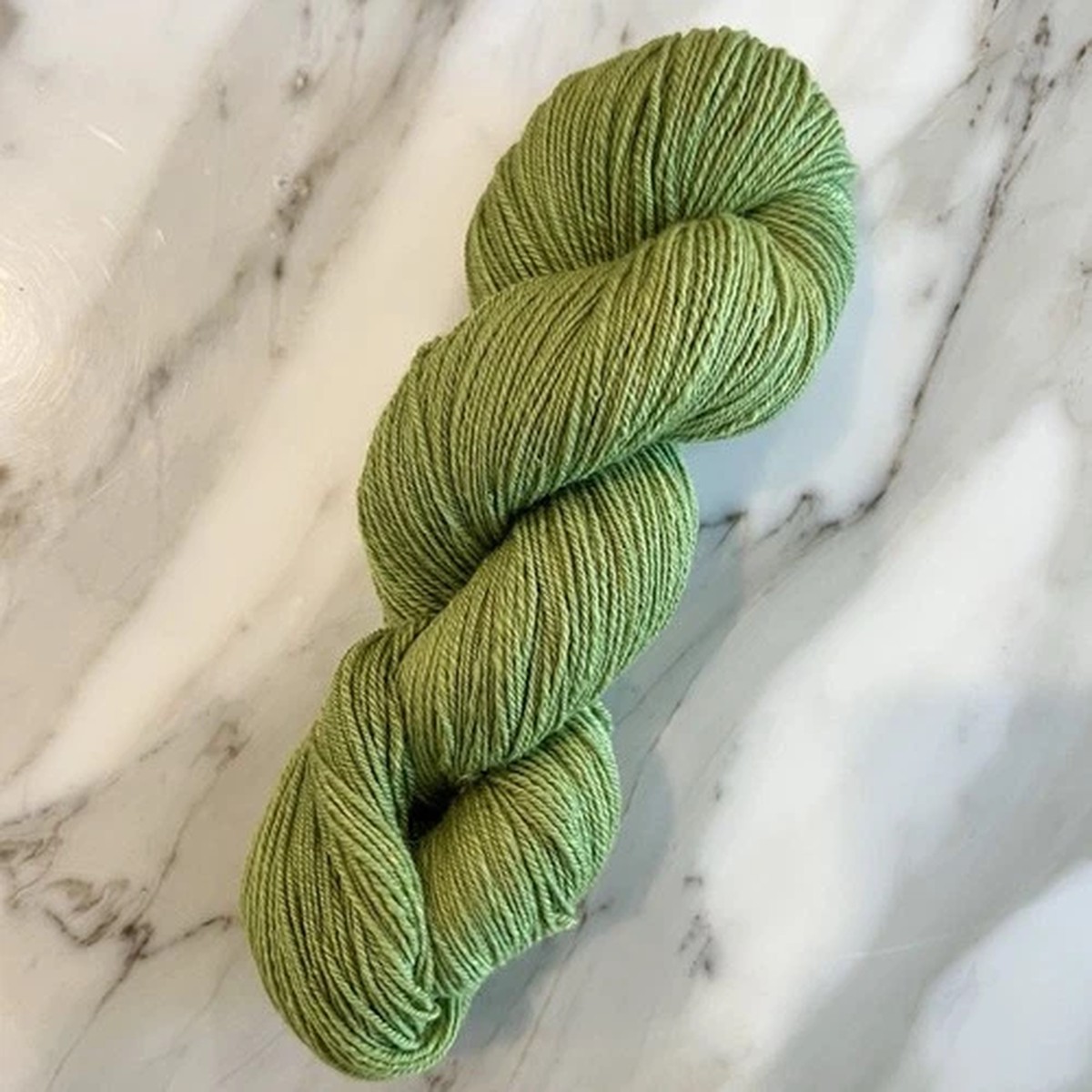 handspun-100-merino-wool-dk-weight-yarn-in-green-canary