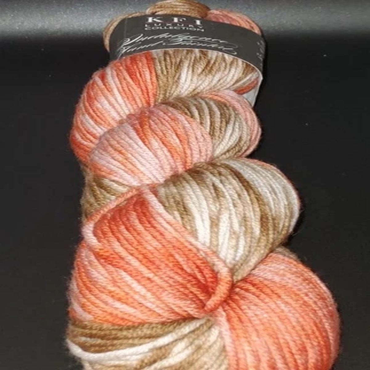 skein-hank-of-kfi-indulgence-hand-painted-yarn-color-11-dune-of-pilat