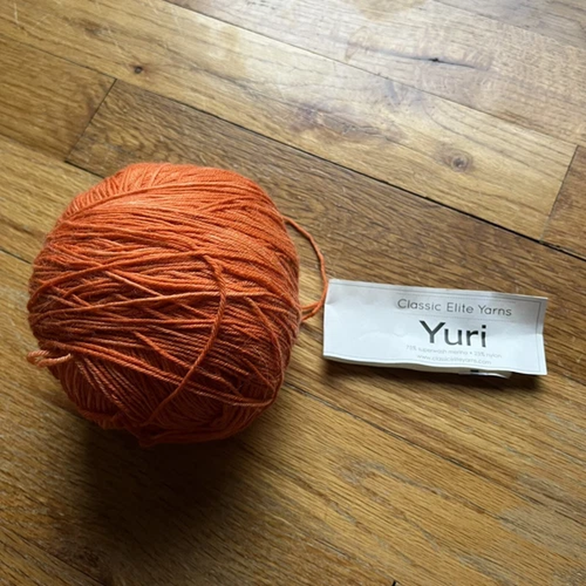 classic-elite-yarns-yuri-superwash-merino-sock-yarn-orange-5085-3-7oz-read