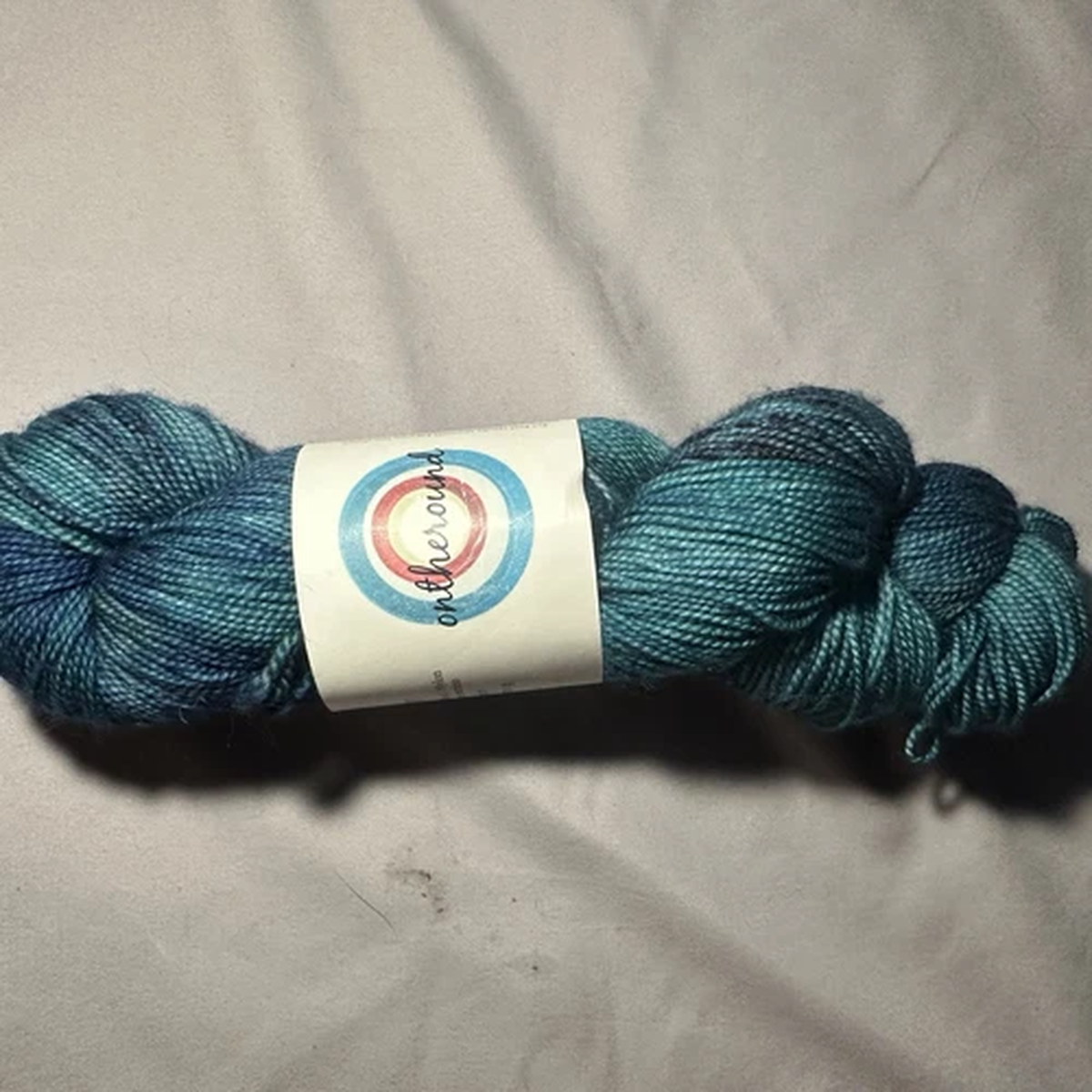 ontheround-nimble-sock-fingering-yarn-sea-blue-merino-nylon-394-yd-2-ply