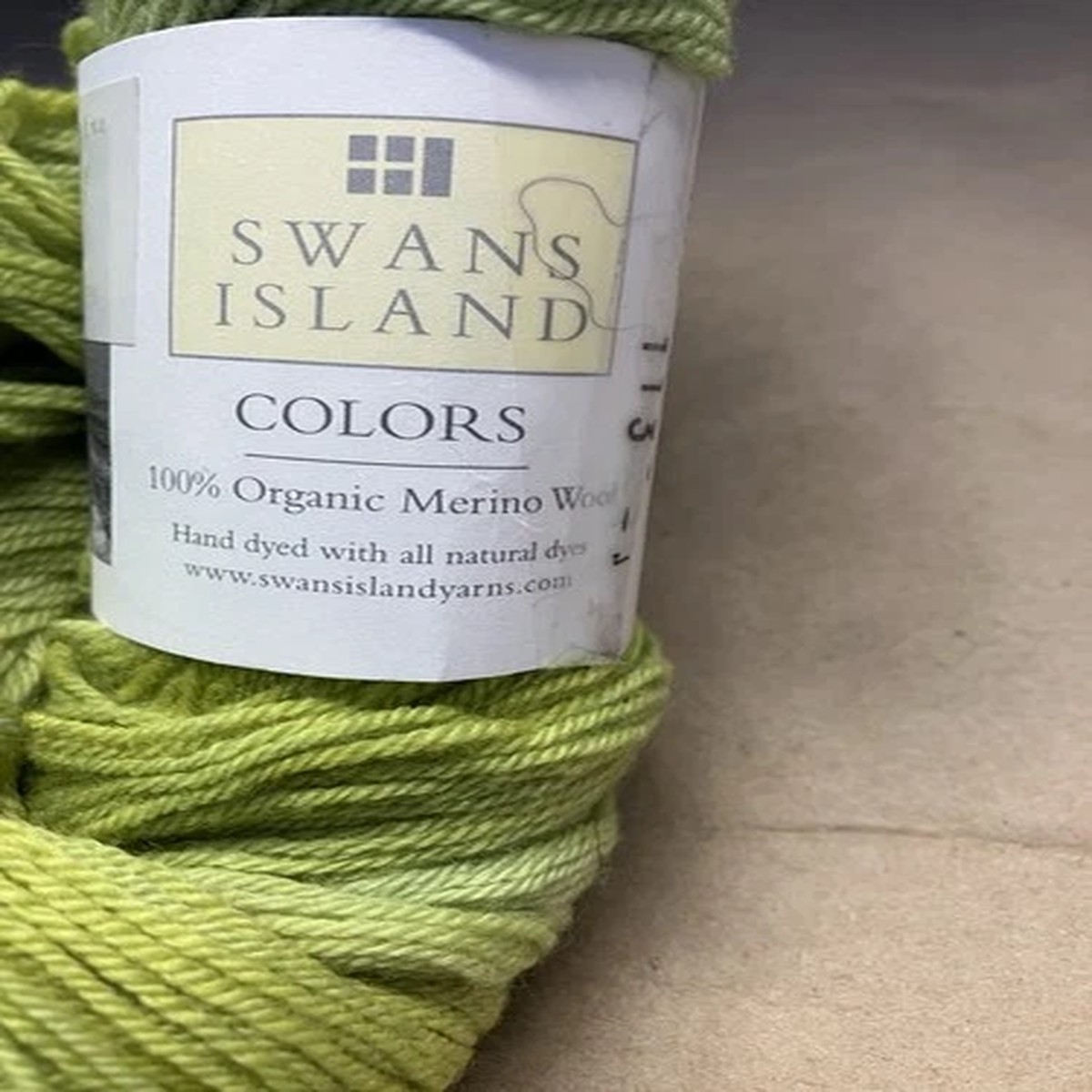 skein-swans-island-colors-merino-fingering-yarn-color-yf109-spring-green-528-yds