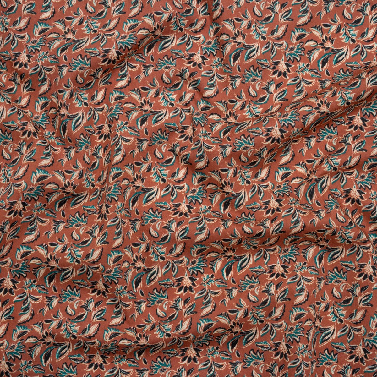 cotton-poplin-print-burnt-orange-and-teal-leaves-mood-exclusive-cranberry-corral